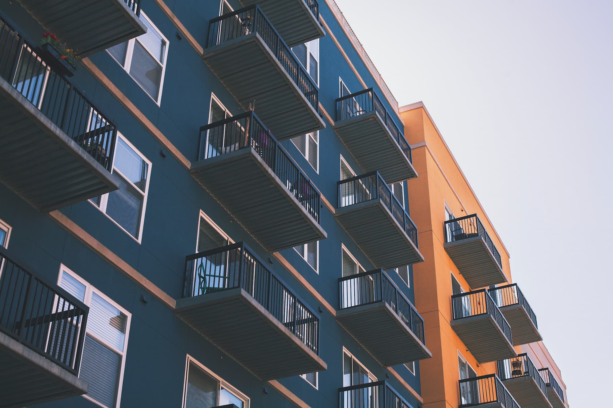 blue and orange apartment complex